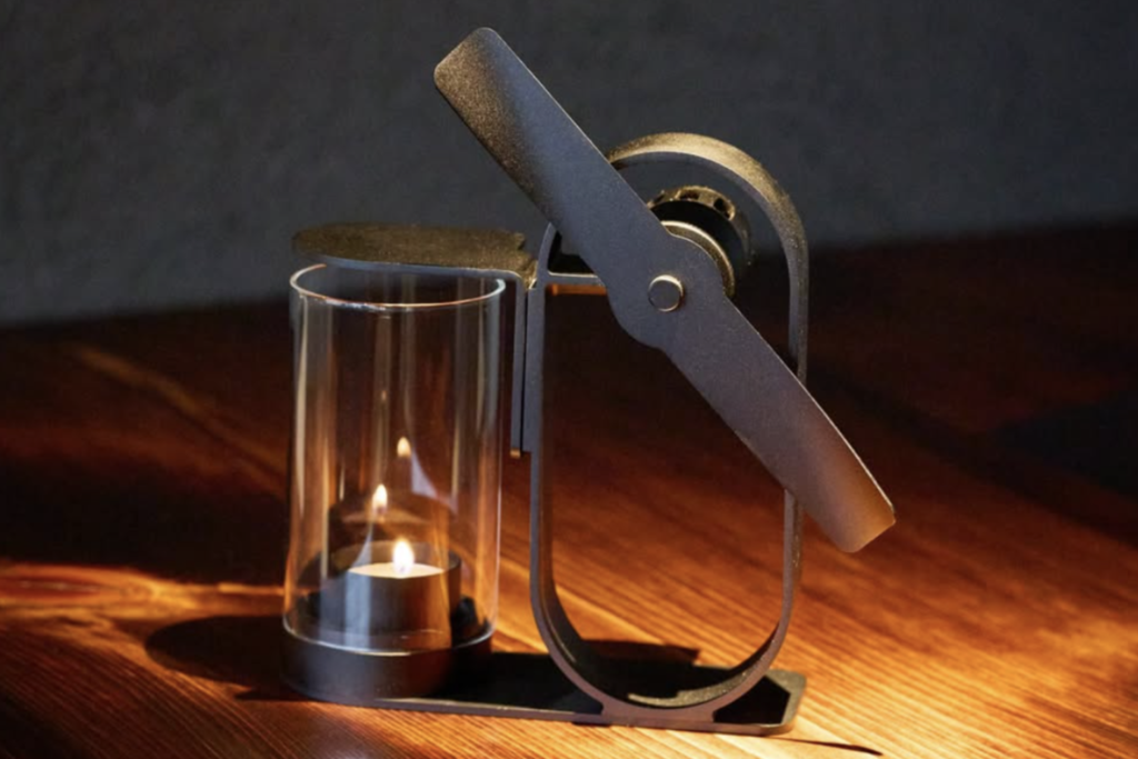 Lei non electric aroma diffuser illuminated by candlelight